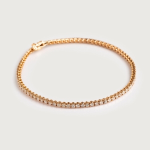 gold tennis bracelet with diamonds