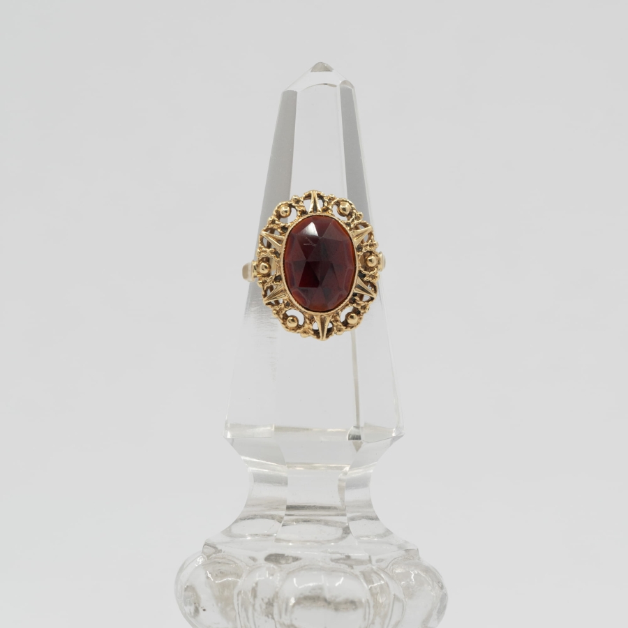 Ring with garnet.