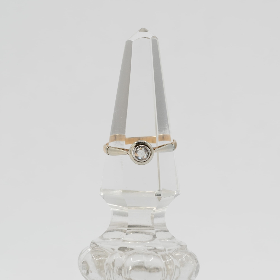 Gold solitaire ring.